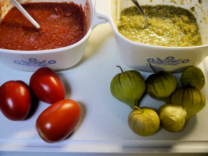 Phot of red and green salso with Roma Tomatoes and Tomatillos.