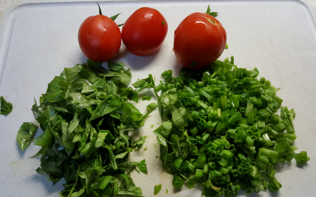 Tomatoes, chives and basil from the garden.